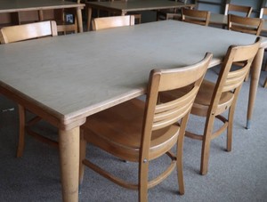LARGE SOLID OAK TABLE AND 4 CHAIRS