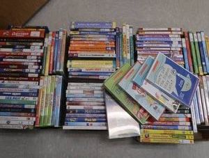 3 BOXES OF DVDS