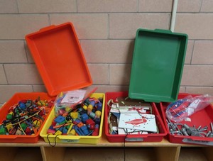 4 TRAYS FULL OF LEARNING TOYSUTENSILS
