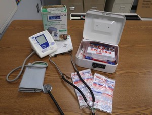 FIRST AID KIT, BLOOD PRESSURE MACHINE AND STETHOSCOPE