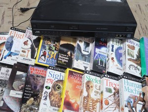 DVDVHS PLAYER AND VHS TAPES