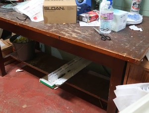 WOODEN TABLE WITH MYSTERY ITEMS