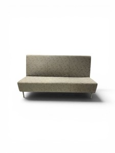 Lounge featuring a grey linen fabric with a subtle pattern and minimalist metal legs Ethernet and power