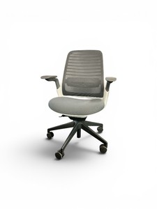 Steelcase Series 1 ergonomic work chair features a light-colored frame and a grey mesh back