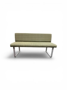 Esto soft seating bench features a unique two-tone design with a patterned green and gold back Retails for $1200