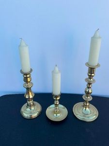 Set of 3 gold candlesticks