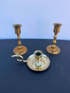 Set of 3 gold candlesticks