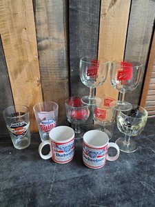 Lot of 9 Various styles of vintage coffee cups and glasses Budweiser, Schlitz and more