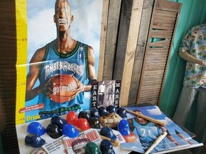 Kevin Garnett Life size Poster with Louiville Slugger Bats toy size, many small baseball hats, and more