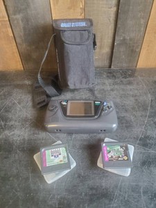Collectible Vintage Game Gear SEGA Video Game System with a few games