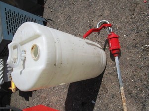 Barrel (12-15gals) and hand pump...