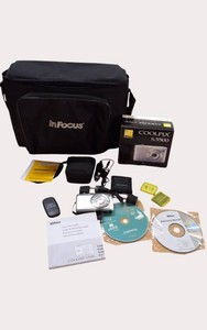 Complete Nikon COOLPIX S3500 20.1MP Digital Camera Bundle  7x Wide Zoom  Case, Charger, Manuals & Accessories