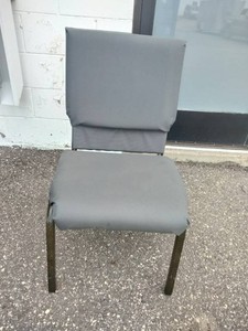 (11) Stackable metal-frame chairs featuring gray, cushioned seats and backs