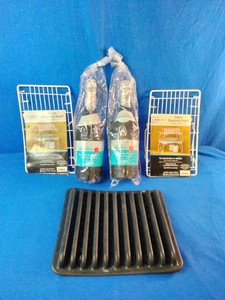 (2) Celebrate brand confetti popper, (2)  Mainstays Short Stacking Shelf, and A rubber straining mat