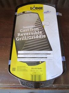 Cast iron reversible grill or griddle