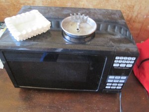 Microwave with vintage ashtrays