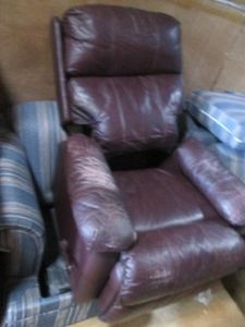 Wine pleather well loved recliner...