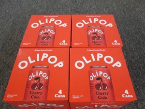 4 4 Pack cans of Olipop cherry cola...