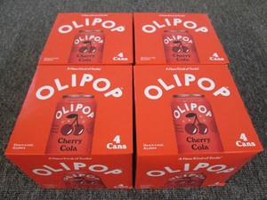 4 4 Pack cans of Olipop cherry cola...