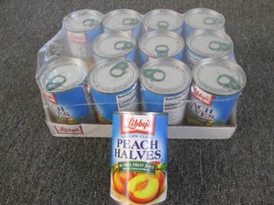 12 Cans of Libbys peach halves...