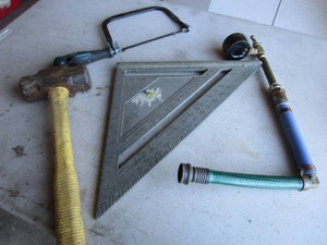 Speed Square, Mallet, Saw, Pressure Tester