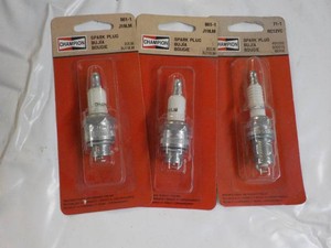 3 Champion Spark Plugs...
