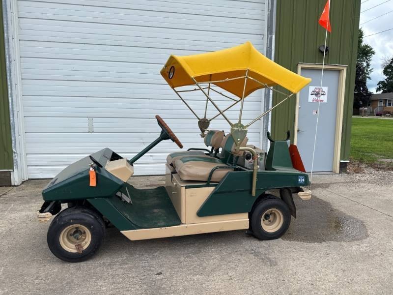 Cushman Golfster Electric Golf Cart with Yellow Canopy
