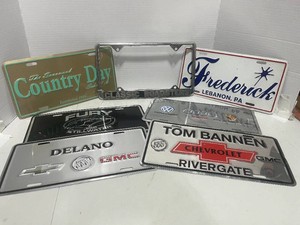 Set of Six Various Dealer License Plates and Cover