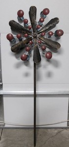 Metal Windmill Sculpture With Red Sphere Accents