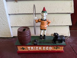 Cast Iron Trick Dog Coin Bank