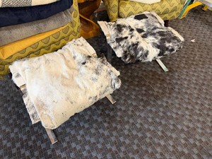 Pair of Mid-Century Modern Metal Frame Ottomans Re-upholstered in Cowhide