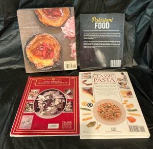 Group of cookbooks and floral arrangement books