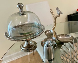 Group of cake stand and silver toned items