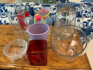 Group of glass pottery and plastic vases