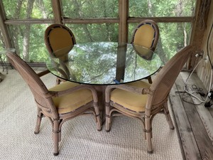 Outdoor Ratan patio set with glass tabletop, chairs