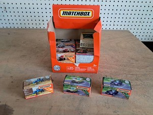 Box of matchbox CarsTrucks  14 Pcs NIB