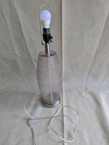 At Home x Grace Mitchell Ribbed Glass Table Lamp with a distinctive pink textured base, pink led lightbulb