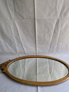 Antique Victorian wall mirror, beautifully carved oak frame and a distinct oval design