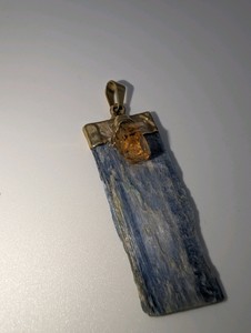 Raw blue kyanite and citrine point pendant, gold plated top