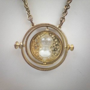 Gold Tone Hourglass Pendant Necklace