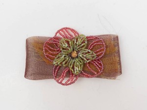 Beaded Floral Brooch With Brown Mesh Ribbon