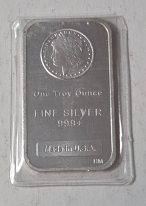 1 Troy Oz. Fine Silver Bar featuring the Morgan dollar design - Sealed