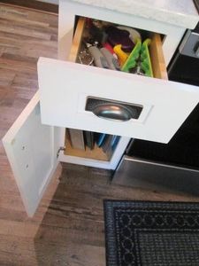Content of lower cupboard and drawe...