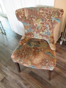Floral velour upholstered chair and...