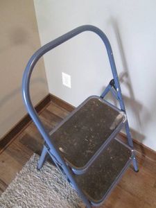 Blue metal folding step stool...