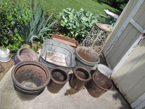 Mostly metal outdoor planters and b...