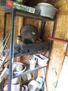 Narrow metal garden shelf plus cont...