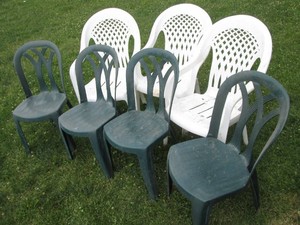 Outdoor patio chairs in green and w...