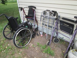 Manually operated wheel chair and v...