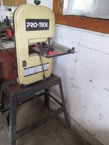 Pro-Tech band saw with metal standv...